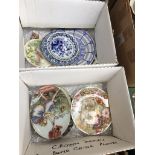 2 boxes containing four Royal Worcester fairy plaques, a Royal Albert plate, and four Royal Albert