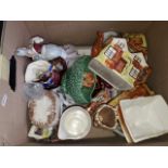 Box containing various items including figurines, cottage tea pots, Silvac, etc
