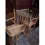 A set of four light beech chairs.