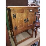 A Priory style bedside cabinet.