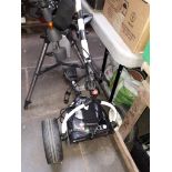 A Motocaddy S1 electric golf trolley with umbrella holder, lithium battery and charger