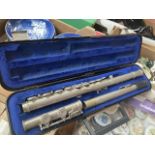 A vintage Evette flute in case.