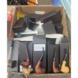 A box of various pipes, mainly boxed - some unused.