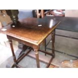 A composite top wrought metal table, a stool and an Edwardian occasional table.