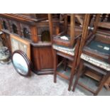 An Old Charm bar and four stools.