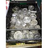 A box containing approx 60 small glass bowls and a box of mugs and small ornaments.