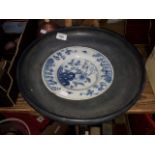 A large soapstone bowl and a 18th / 19th century blue and white Chinese plate.