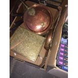 A box of brass and copperware and a set of graduated Victorian brass pans.