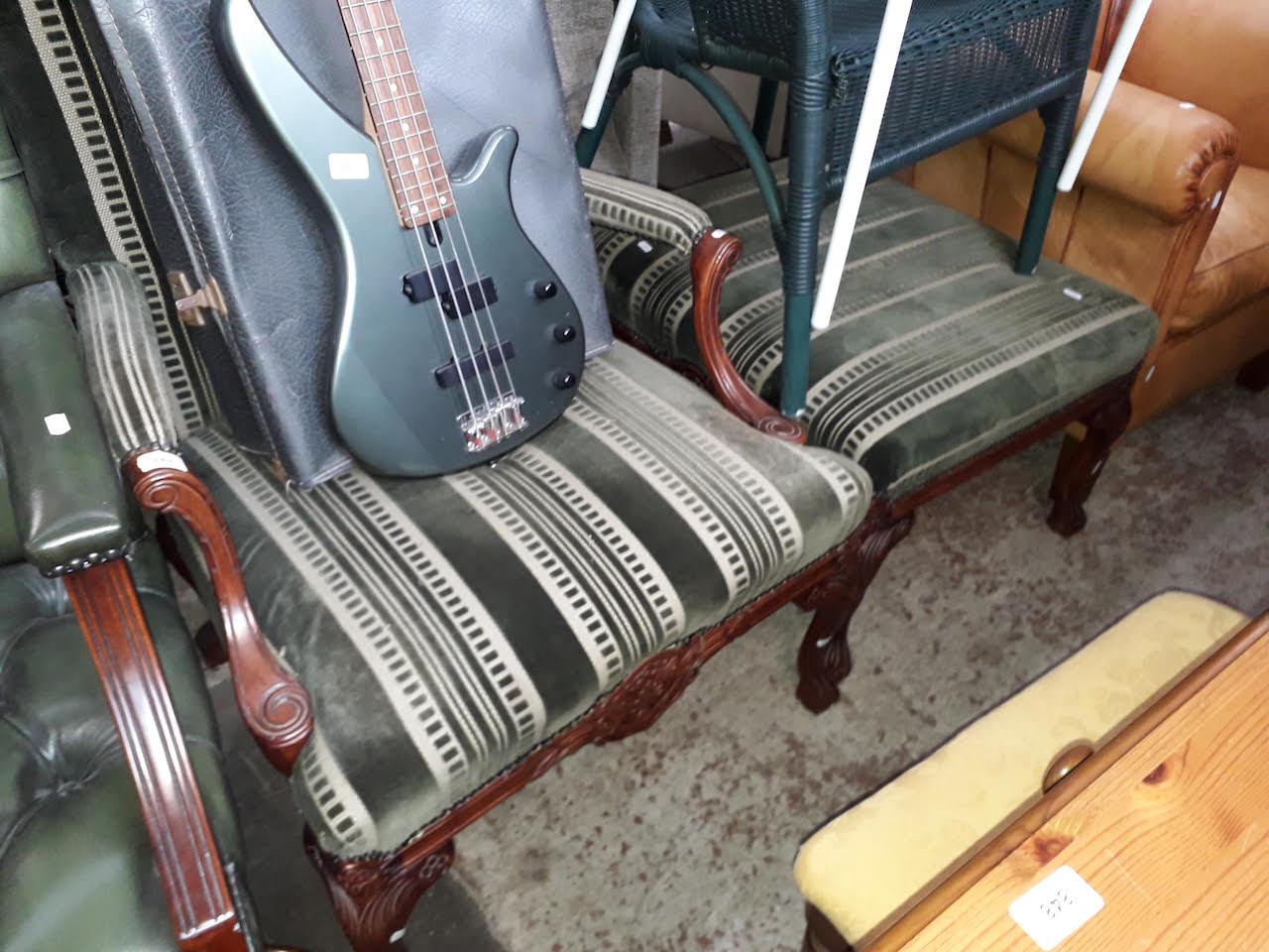 A reproduction armchair and matching stool, together with two chairs.