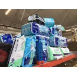Large quantity of Tena pads and cleaning dry wipes.