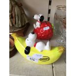 Two snoopy money boxes