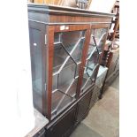 A mahogany glass fronted display cabinet