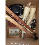 A mixed lot comprising two carved walking sticks, a Pentacon camera, a tape measure, a miniautre