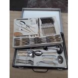 A boxed stainless steel cutlery set by Bestecke Solingen.