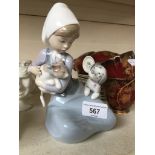 Lladro figurine of a lady with a cat and puppy