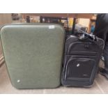 A vintage Spartan case containing a holdall and a handbag and a suitcase on wheels.