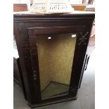 An oak glazed corner display cabinet with unusual brass hinges, height 124.5cm, width 84cm and depth