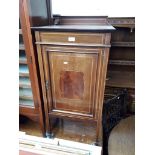 An Edwardian inlaid mahogany music cabinet, height 104cm, width 39cm and depth 41cm
