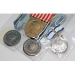 Four assorted medals including 2 x Greek WWII, 1 x Russia order of motherhood 1st class, 1 x