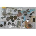 A collection of ancient coins to include 1 x Justinian I 527-565 A.D follis, various Roman silver,