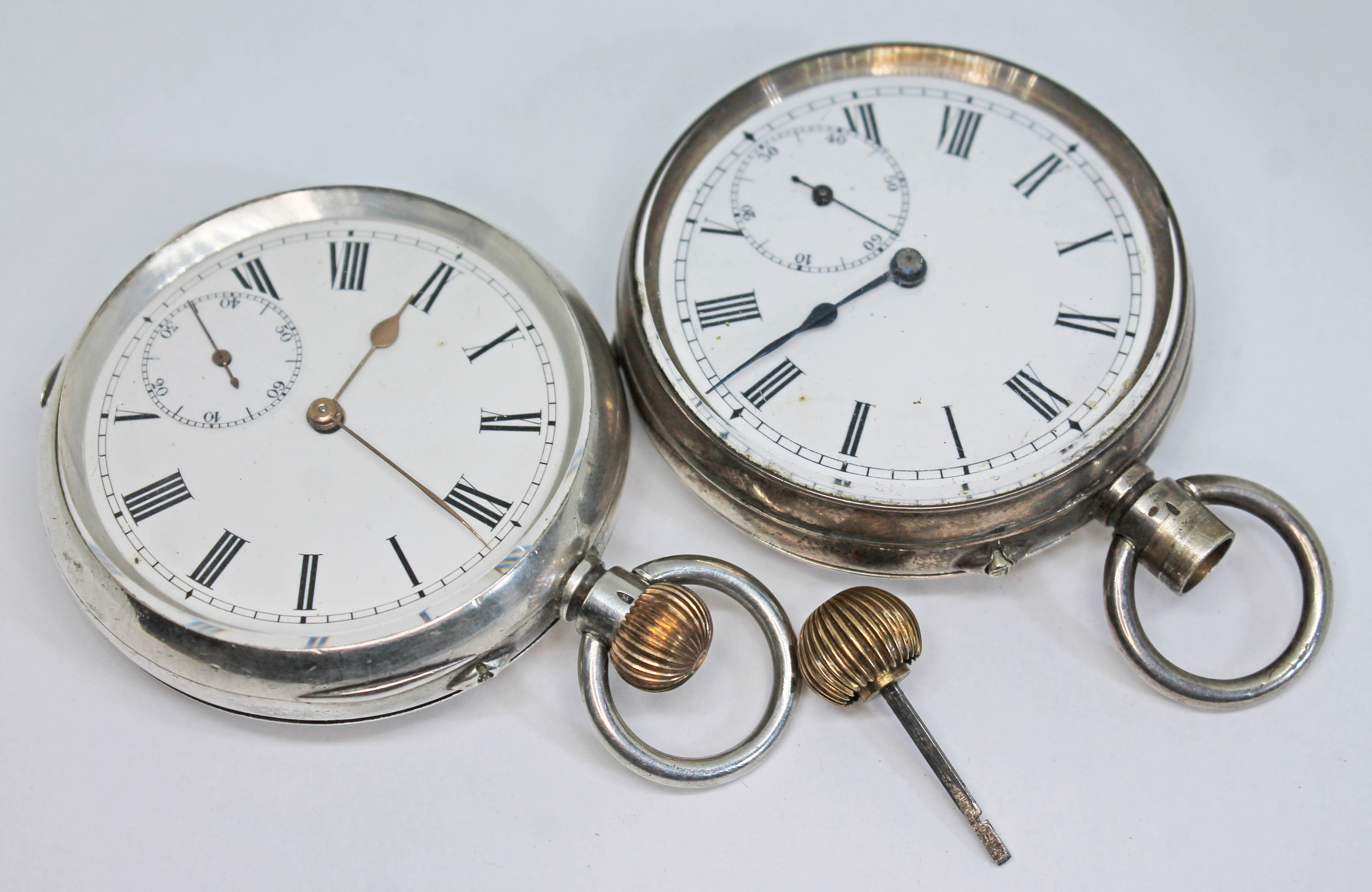 Two antique Swiss silver open faced pocket watches comprising a Stauffer & Co and another with