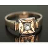 An antique diamond ring, the Old European oval stone weighing approx. 0.24 carats, band unmarked,