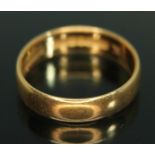 A hallmarked 22ct gold wedding band, wt. 3.66g, size K/L.