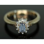 A 9ct gold sapphire and diamond cluster ring, the cluster measuring approx. 8.49mm x 6.57mm,