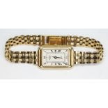 A 9ct gold Rotary ladies quartz wristwatch on hallmarked 9ct gold bracelet strap, the inside case