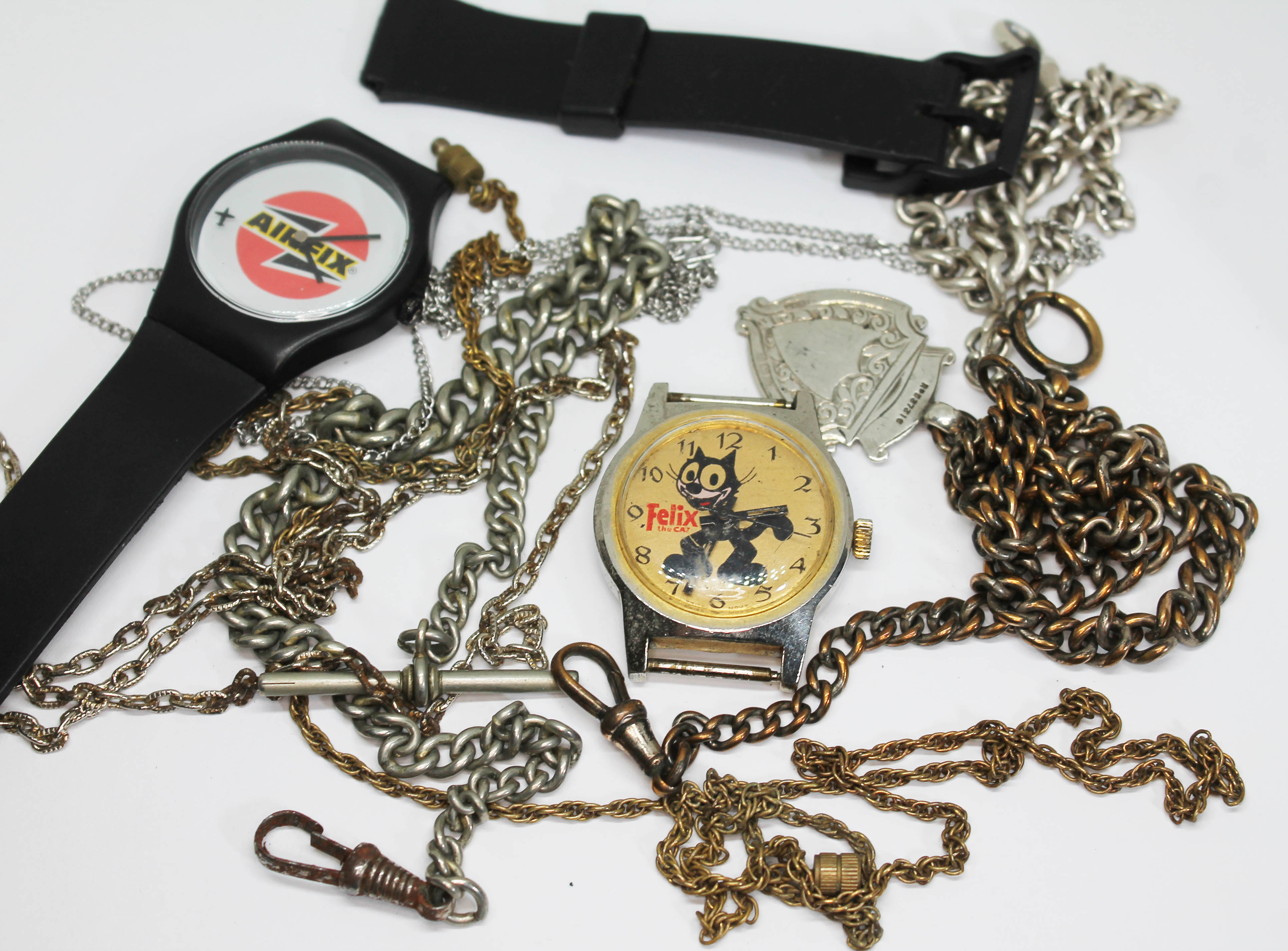 A quantity of various watch and other chains including a hallmarked silver watch chain, Length 30.