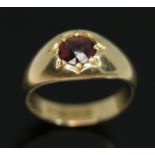 An 18ct gold garnet signet ring, sponsor's mark rubbed, London 1923, gross wt. 6.07g, size L/M.