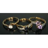 A hallmarked 9ct gold ring and two others marked '375', various settings, gross wt. 3.64g, sizes