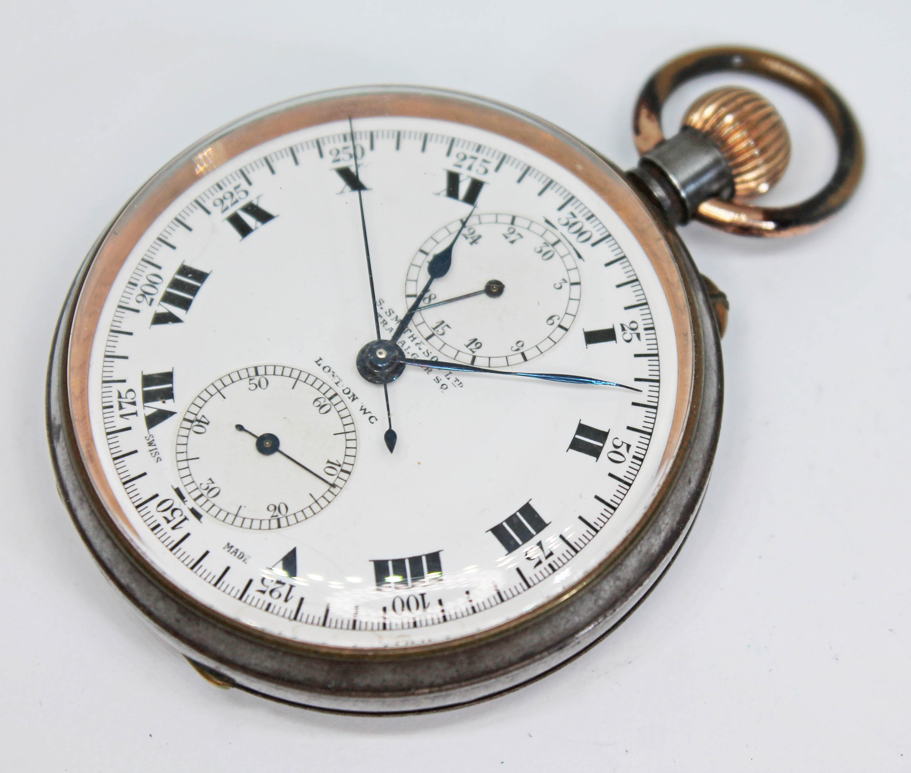 An early 20th century S. Smith & Son (Smiths) gun metal cased chronograph centre seconds open face