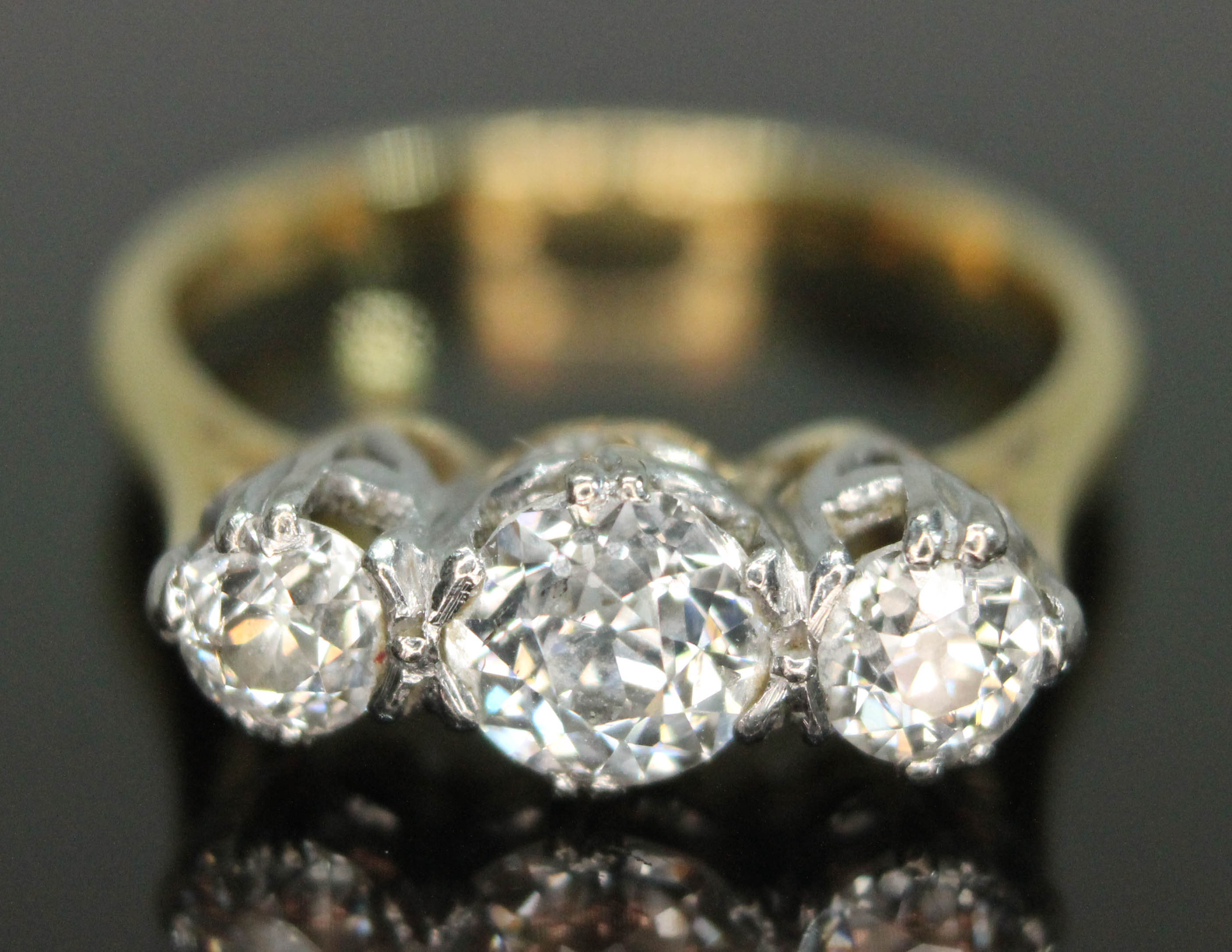 A three stone diamond ring, the Old European cut diamonds weighing approx. 0.30, 0.72 & 0.33 carats, - Image 3 of 3