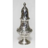 A George V silver sugar castor with screw top, Walker & Hall, Sheffield 1925, height 21.5cm, wt.