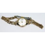 A 1960s hallmarked 9ct gold Regency 17 jewel manual wind ladies wristwatch on rolled gold strap with
