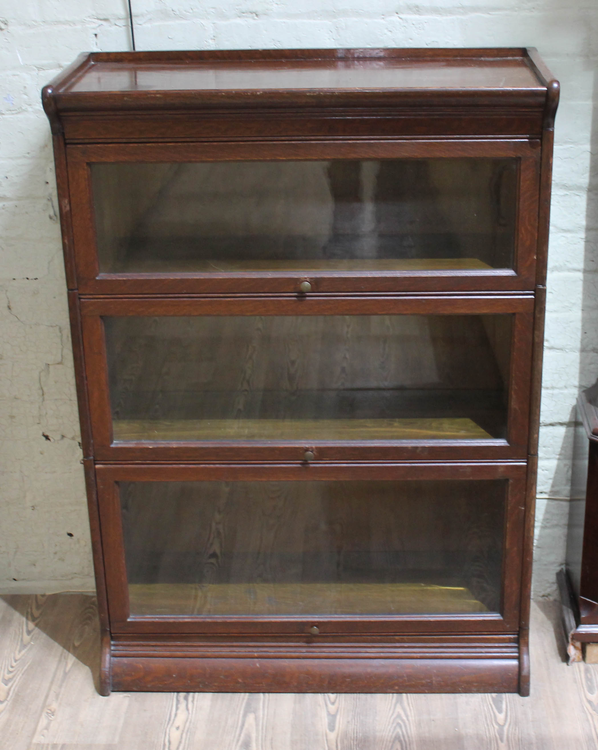 An early 20th century oak sectional bookcase, width 87cm, depth 35cm & height 122cm.