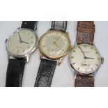 Three vintage wristwatches comprising a chrome plated Smiths Astral having signed champagne dial