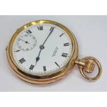 A gold plated open face pocket watch with white enamel dial signed for H. Samuel, Manchester and