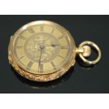 An early 20th century Swiss 18ct gold ladies open faced pocket watch having foliate engraved dial