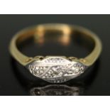 A three stone diamond ring, maker's mark 'AWC&S', also marked '18Ct PT', gross wt. 2.45g, size O.