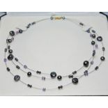 A modern three wire strand beadless cultured pearl and amethyst choker necklace with clasp marled '