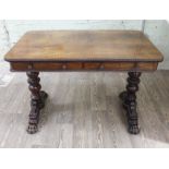 A George III Regency period rosewood two drawer library table in the manner of Gillows with beaded