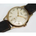 A vintage hallmarked 9ct gold Trojan wristwatch having signed champagne dial with Arabic numerals