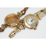 An early 20th century hallmarked 9ct gold ladies wristwatch on rolled gold strap, together with an