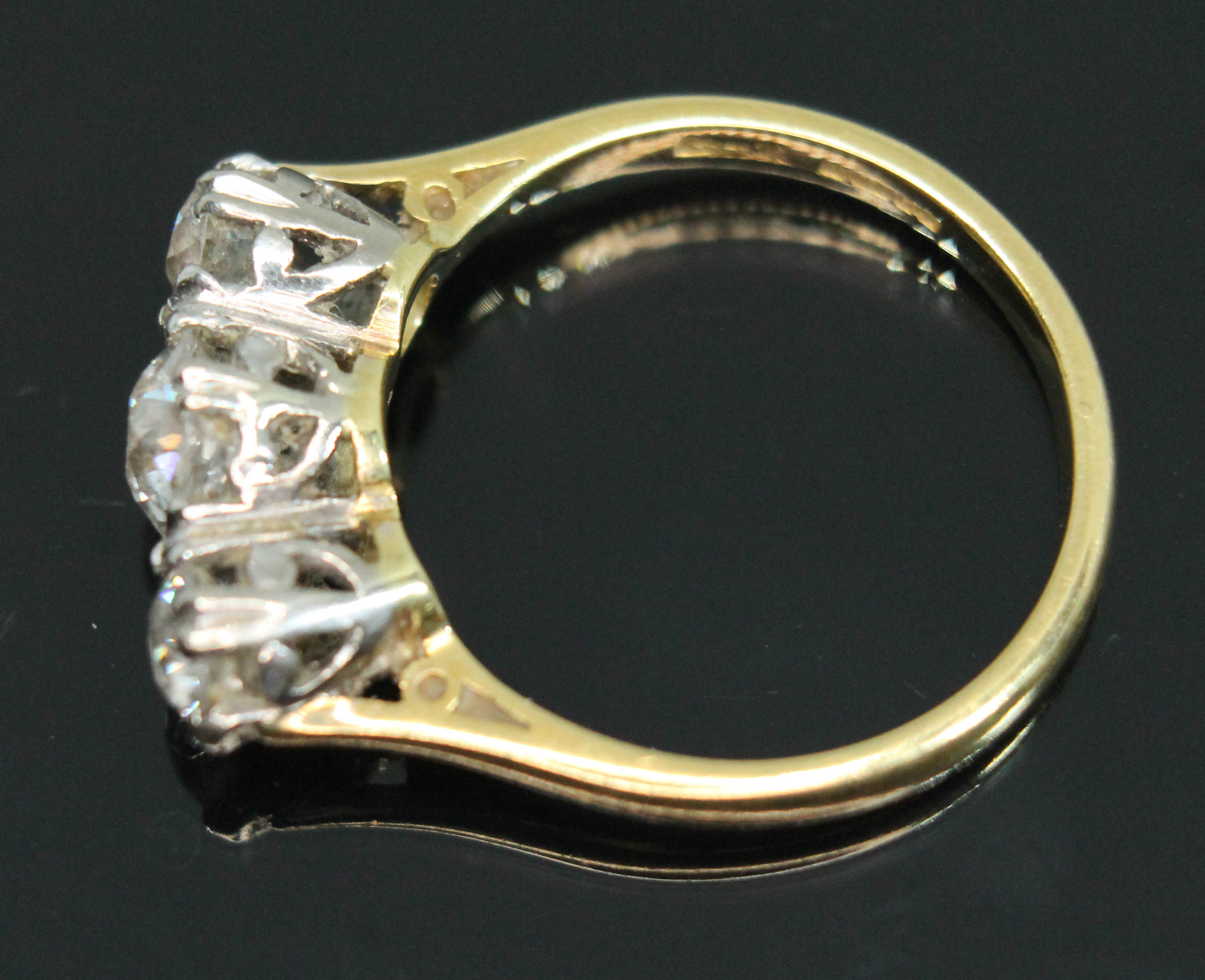 A three stone diamond ring, the Old European cut diamonds weighing approx. 0.30, 0.72 & 0.33 carats, - Image 2 of 3