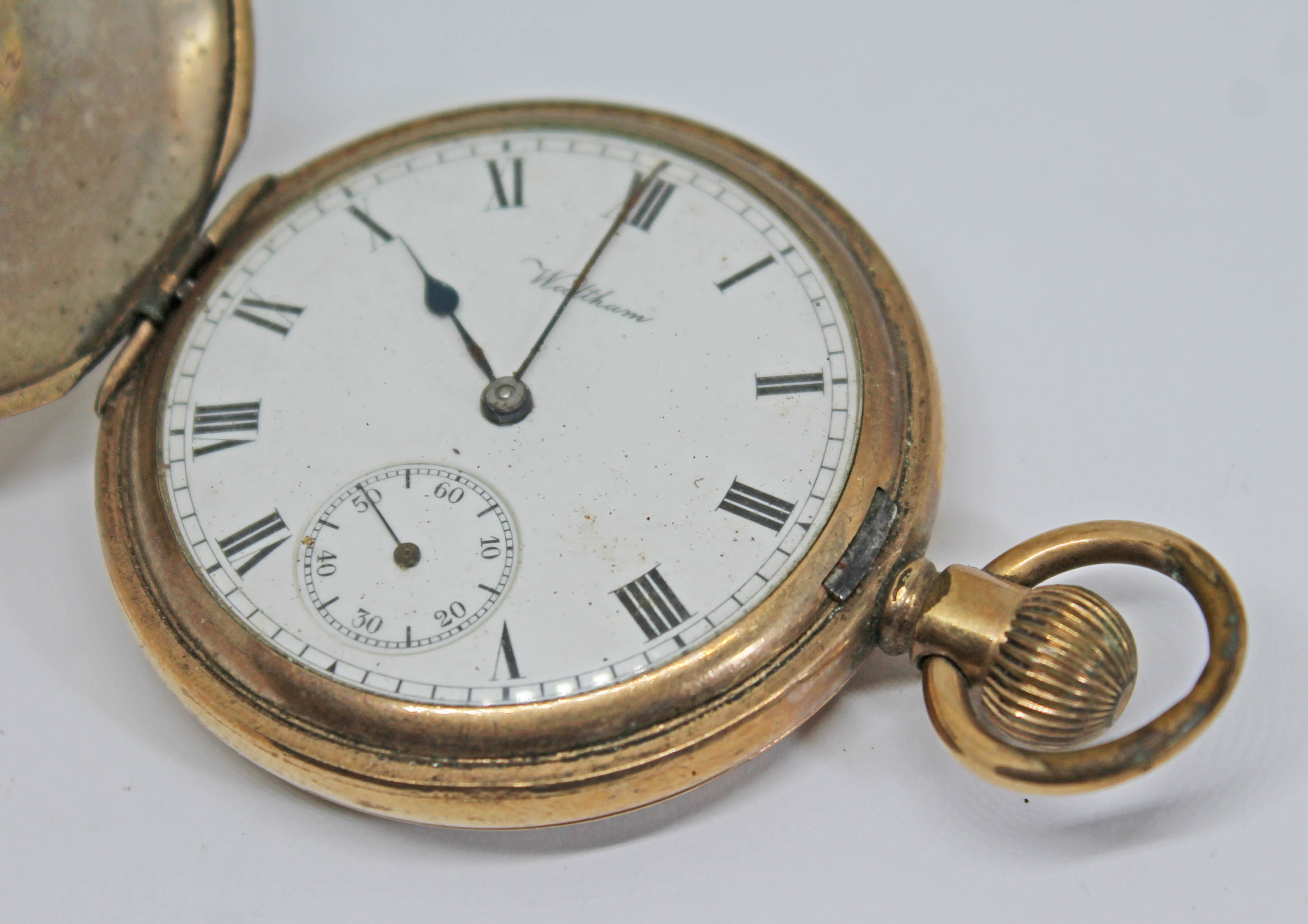 An early 20th century gold plated Waltham full hunter pocket watch, circa 1910 having signed white