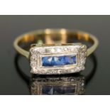 An early 20th century diamond and sapphire cluster ring, the rectangular cluster measuring 12.95mm x