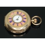 A continental 14ct gold half hunter ladies pocket watch having white enamel dial with Roman