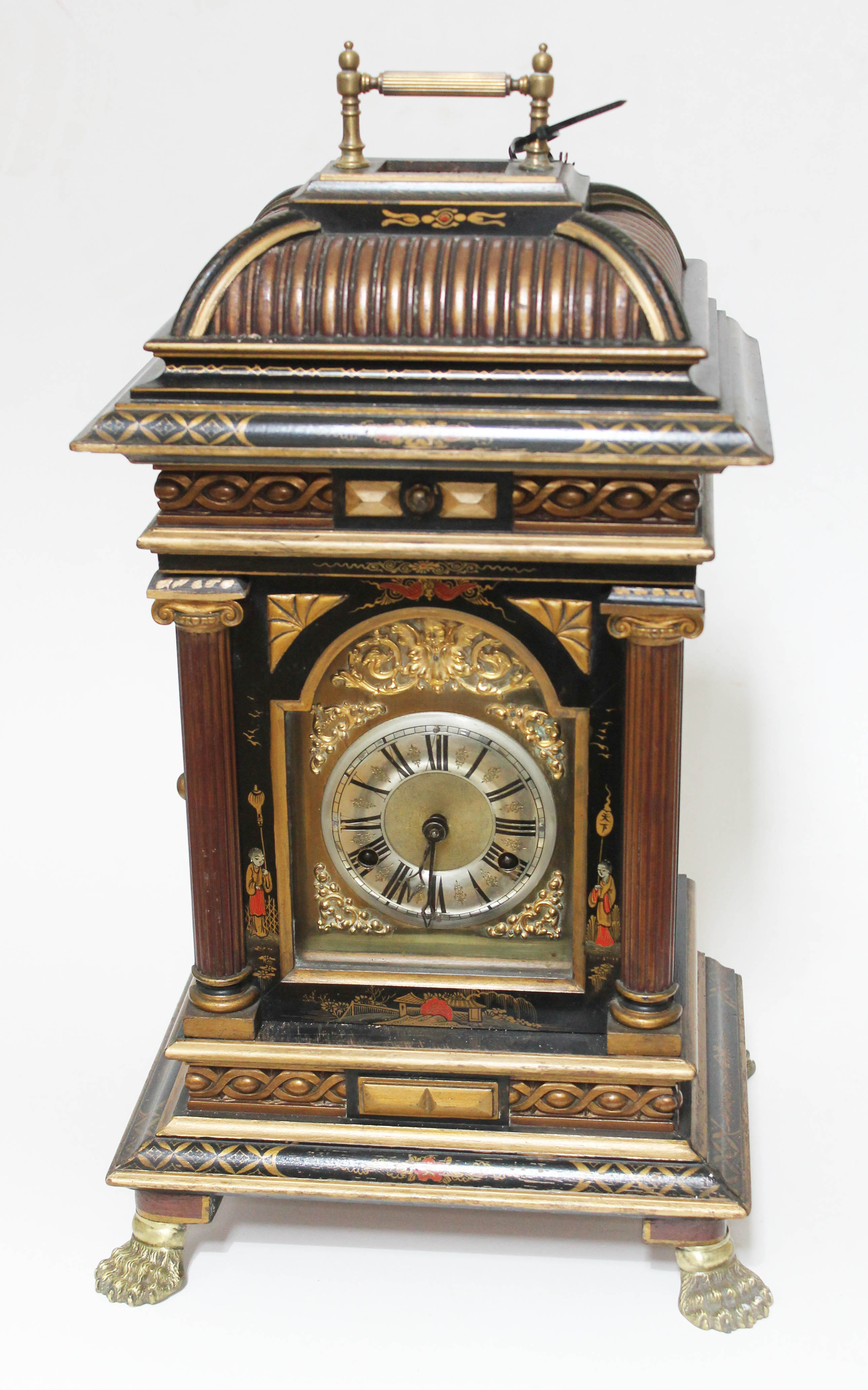 A Junghans polyphon mantle clock, Chinoiserie decorated case, raised on four claw feet, height 56cm.